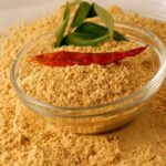 1-2 Taste CEC - Wok Aroma Powder Flv - 0180 shown a spowder in a bowl