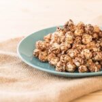 CEC Chocolate Sweet Popcorn Flavour Powder 3795-16 shown as chocolate popcorn on a plate