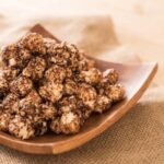 1-2 Taste CEC Chocolate Sweet Popcorn Flavour Powder 3795-16 displayed as a chocolate popcorn on a plate