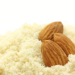 1-2 Taste CEC - Badam Powder Flavour - 0246 displaye as powder with almond on it