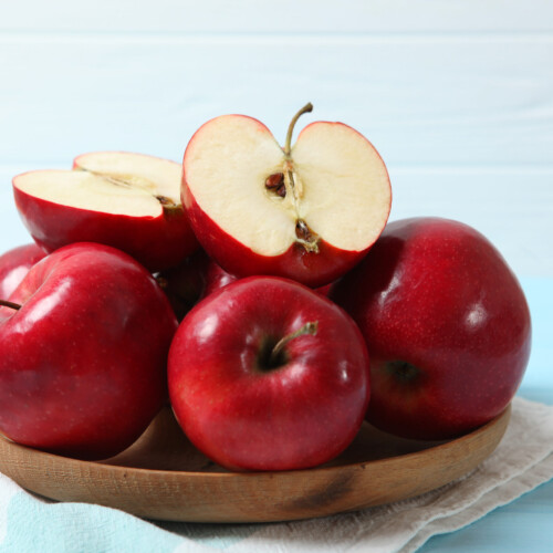 1-2 Taste IFF - Apple Flavour - S 2279 displayed as apples on a wooden plate
