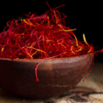 1-2 Taste CEC - Spanish Kesar Flavour - 1366 displayed as saffron in a wooden bowl
