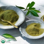 1-2 Taste Australian Native Products – Organic Lemon Myrtle Dried Leaf Fine Cut shown as organic green leaf powder in ceramic bowls with fresh leaves