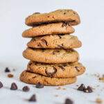 1-2 Taste Calpro - Spark Cookie Improver show as stack of chocolate chip cookies with scattered chocolate chips