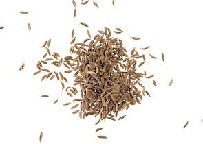 Cumin seeds or caraway isolated on white