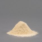 1-2 Taste Aloja Starkelsen - Organic Brown Pea Protein Concentrate shown as light beige fine powder on grey background