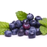 1-2 Taste Aroma INC - Blueberry Flavour Liquid - O21201 shown as Fresh ripe blueberries with mint leaves on a white background