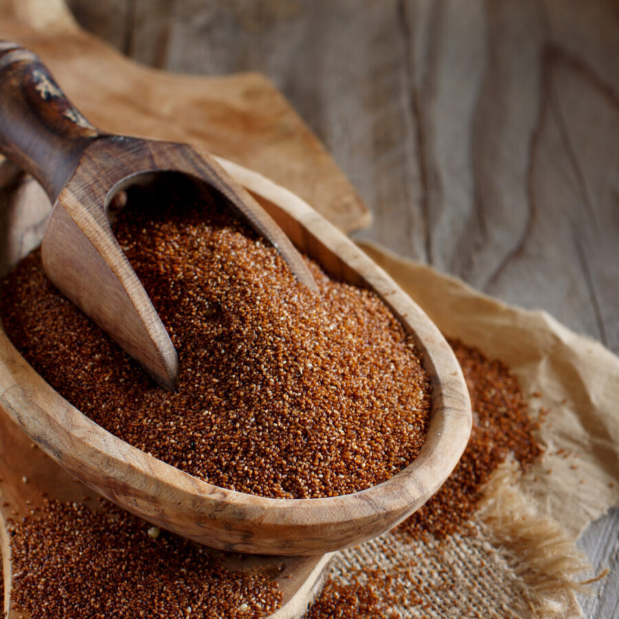 Uncooked,Teff,Grain,In,A,Bowl,With,A,Spoon,Close