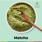 1-2 Taste Matrix - Matcha Flavour Powder - 3169098 in bowl with wooden spoon on pastel background