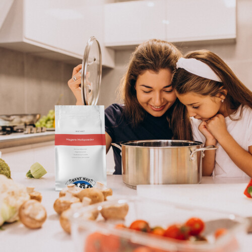 1-2 Taste Best Way Ingredients - Skimmed Milk Powder Instant shown as mother and daughter cooking in kitchen with milk powder pouch and fresh vegetables on counter