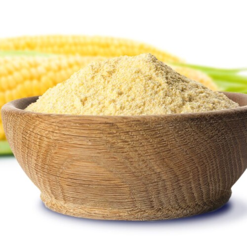 1-2 Taste FiberSMART Corn Powder 90% in a wooden bowl beside fresh corn