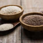 1-2 Taste Sarda Bio Polymers - ISABGOL 10A (Psyllium Husk Powder 99% pure) shown in wooden bowls on rustic wooden surface