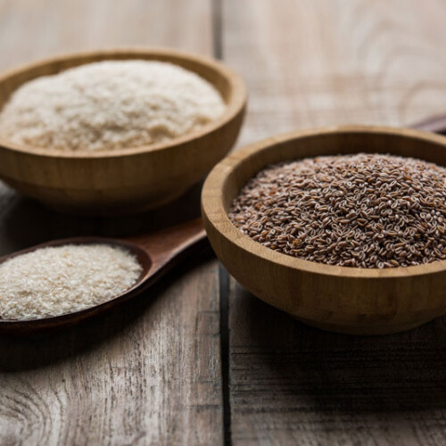 1-2 Taste Sarda Bio Polymers - ISABGOL 10A (Psyllium Husk Powder 99% pure) shown in wooden bowls on rustic wooden surface