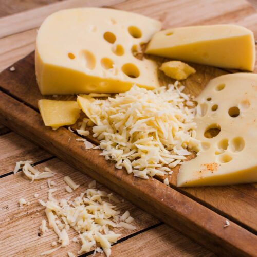 1-2 Taste Trigona - Emmentaler grated on wooden board