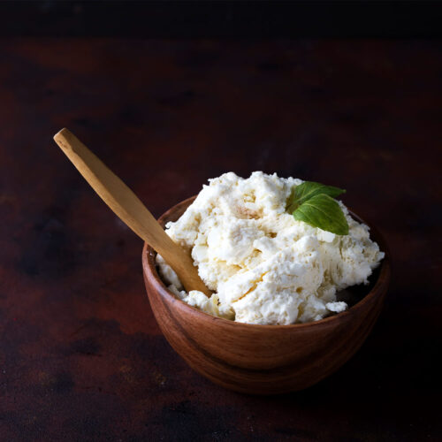 1-2 Taste Trigona - Buffalo Ricotta in wooden bowl with wooden spoon