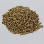 1-2 Taste Dace - Organic Ginger TBC shown as finely chopped dried ginger on white background