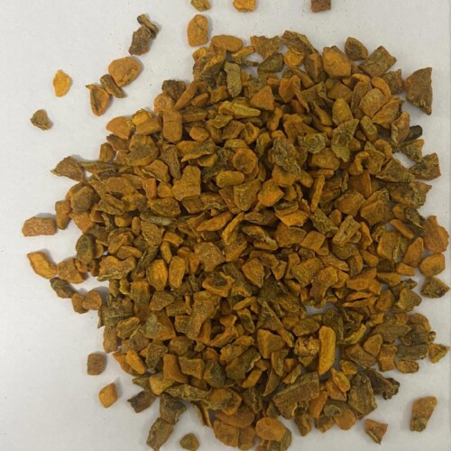 1-2 Taste Dace - Organic Turmeric TBC shown as finely chopped dried turmeric root on white background